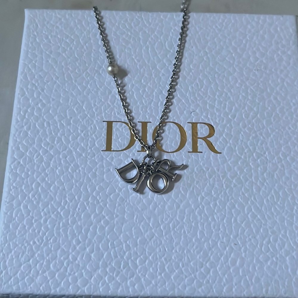 Dior revolution necklace silver with white resin Pearl.